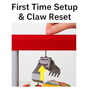 Claw inside machine near the right side under the prize door