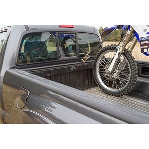 Motorcycle tie-down rack in a pickup