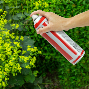 Spray can product in use