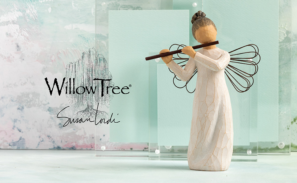 Angel of Harmony figure holding flute, playing