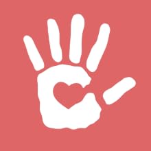 hand wth heart in middle