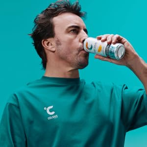 man drinking a Celsius