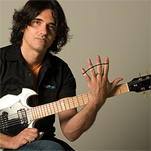 Place the first Riff BAND over your fingers.