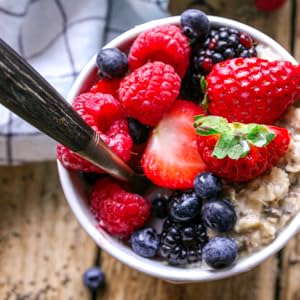 cup of oatmeal with berries