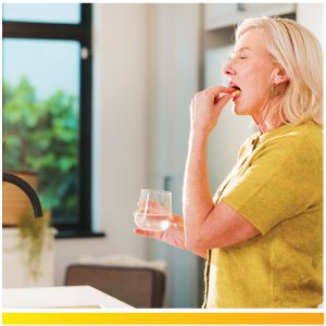 Woman taking her pills