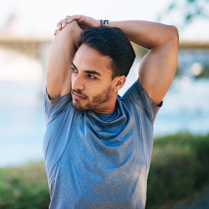 Man stretching his arms