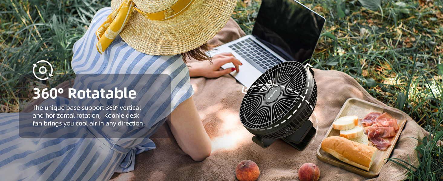 Portable fan device with '360° Rotatable' text overlay, shown in outdoor setting with laptop and picnic items.