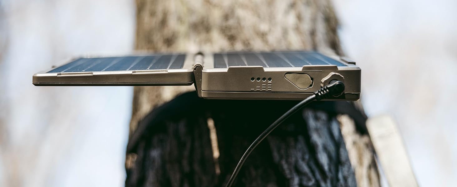 tactacam reveal folding solar panel mounted to a tree