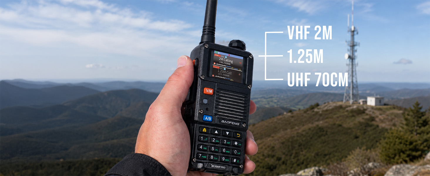 BF-F8HP PRO handheld on a hilltop showing tri-band amateur operation with VHF 2M 1.25M, and UHF 70CM
