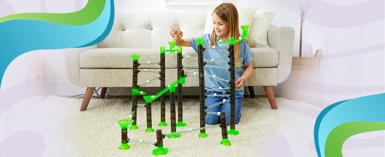 Green and black marble run with rails