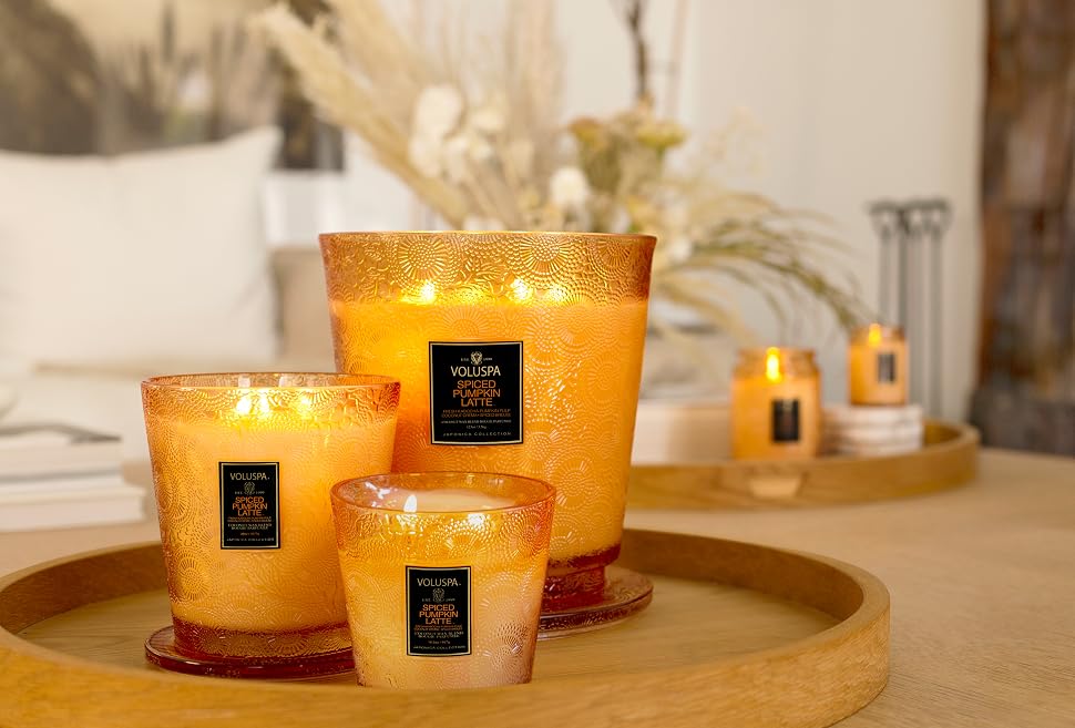 Spiced Pumpkin Latte candles on a tray in a living room.
