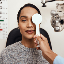 Woman completing vision exam