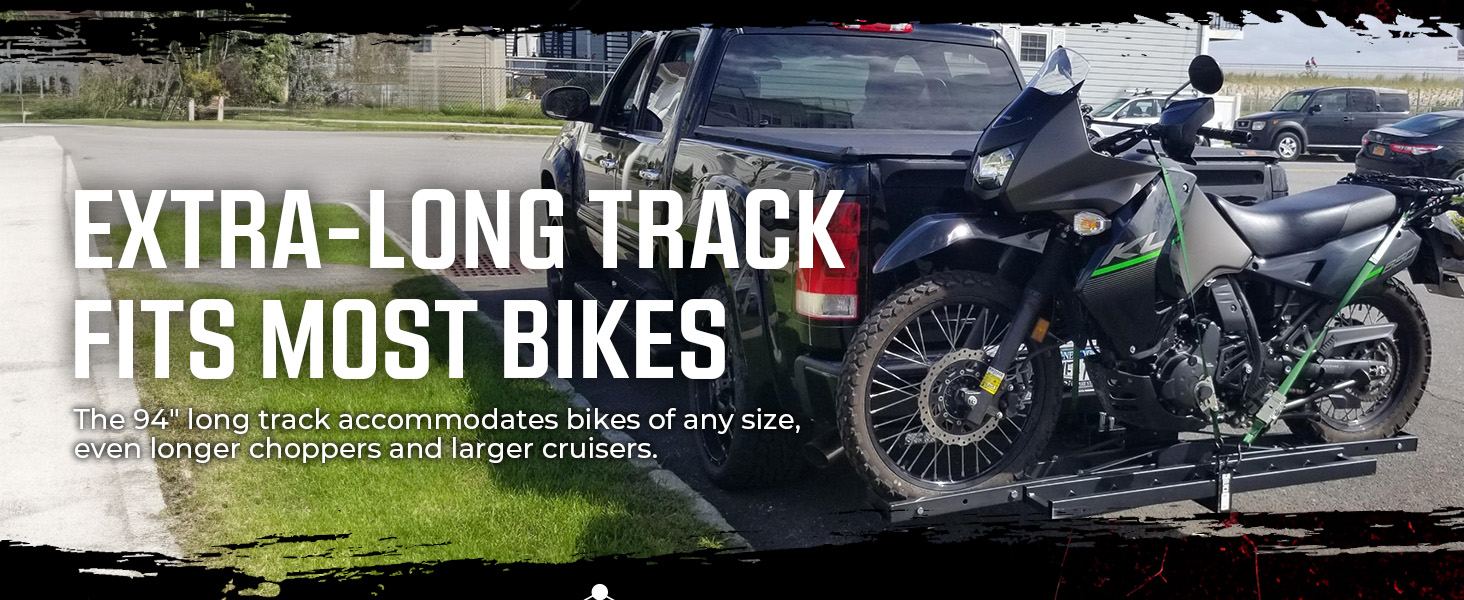 Motorcycle on dolly with five locking casters, showcasing smooth mobility in a garage setting.