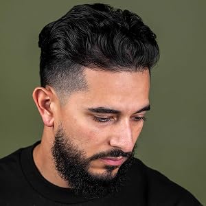 Man with wavy hair styled with Suavecito Hair Cream