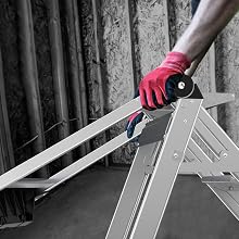 Man folding down Jumbo Step handrail