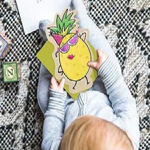 Baby holding a fun card