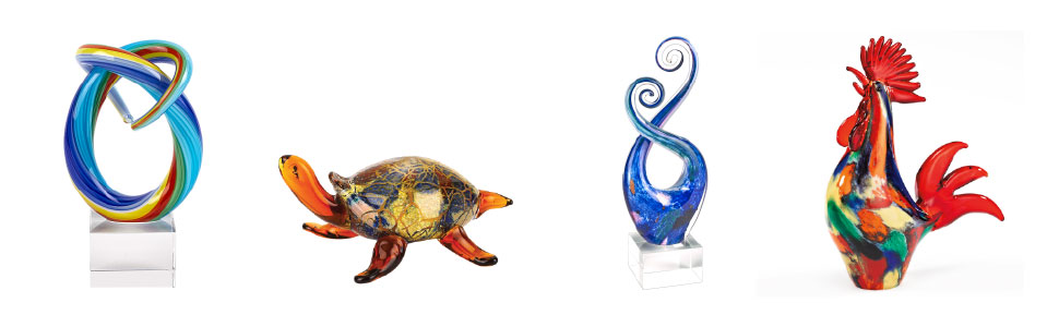 Image of two blown glass art pieces and two colorful animal figurines.