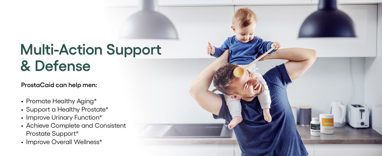 Healthy father with young son on his shoulders playing in the kitchen