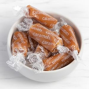 Wrapped Caramels in Bowl on Marble