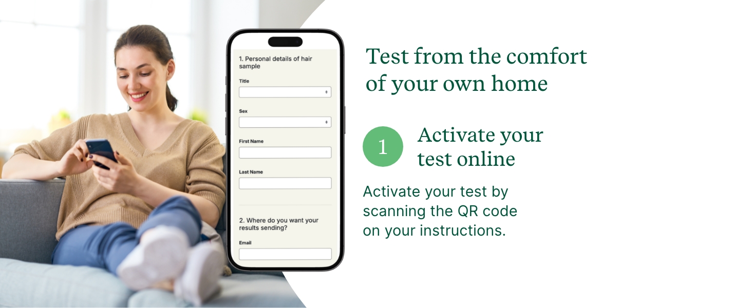 A woman activating a gluten testing kit online via her smartphone smiling while sitting on a couch
