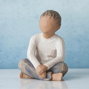 Willow Tree Imaginative Child, figure of cross-leg seated boy with arms folded in lap.