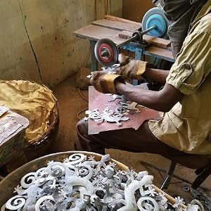 Metal Wall Geckos being Cut