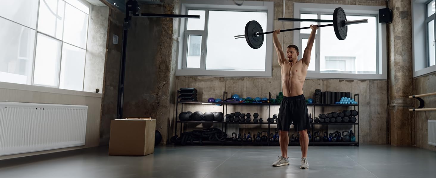 BulkSupplements Whey Protein Isolate Benefits Man Lifting Weights