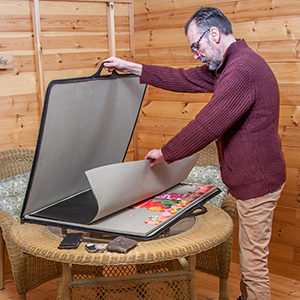 Protective sheet keeps puzzles from moving