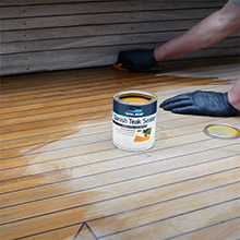 Applying TotalBoat Danish Teak Sealer to a teak boat deck for lasting protection