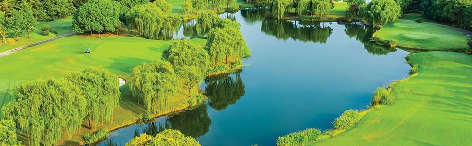 Areial View of golf course with clean blue pond