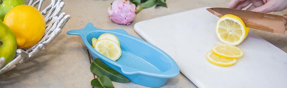 white marble cutting board dip bowl copper knife cambridge fruit bowl basket blue fish lemon apple