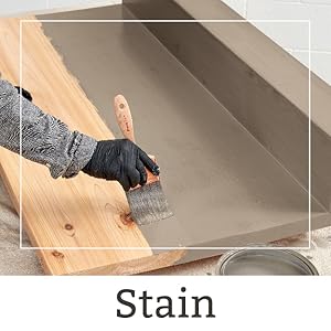 painter staining wood