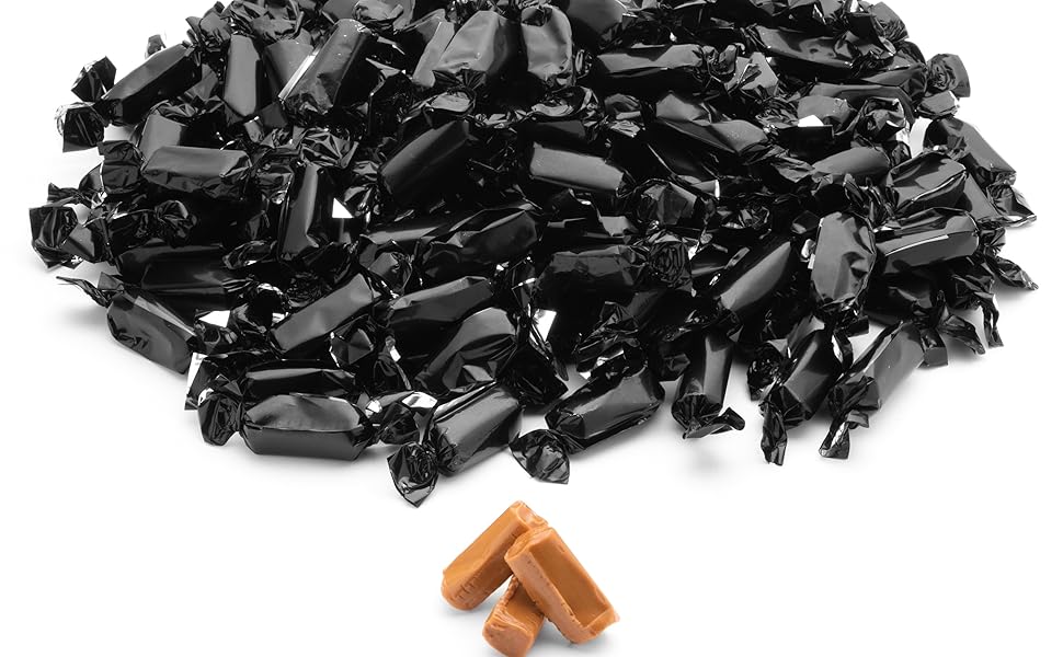 Open Caramels in front of pile of Black Wrapped Caramels