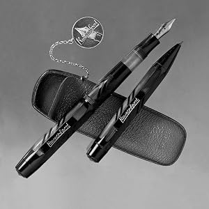 a black and white photo of a fountain pen and a pen.