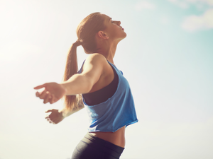 Active woman enjoying the outdoors and a healthy lifestyle.