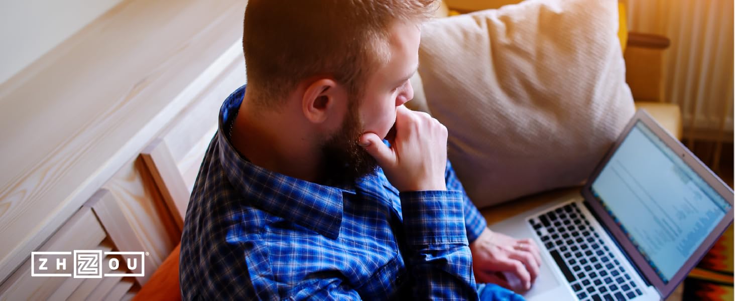 man using laptop