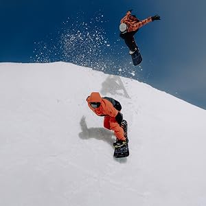 two men snowboarding