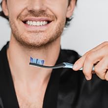 Man about to brush his teeth