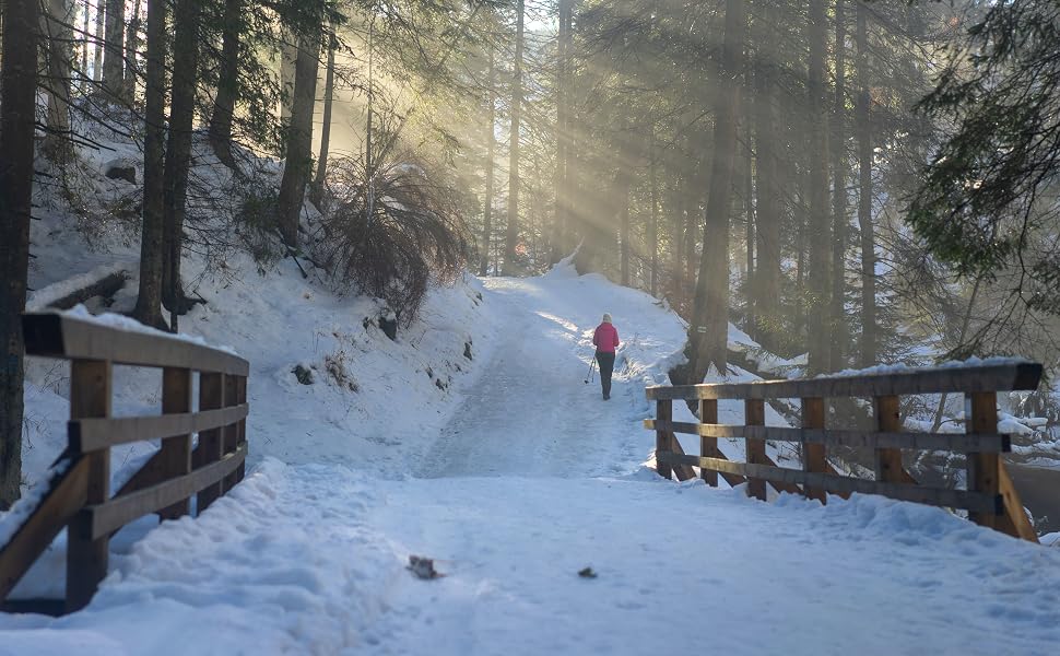 person hiking in snow