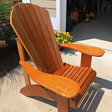 TotalBoat Gleam High Build Varnish Used on Outdoor Wooden Adirondack Chair