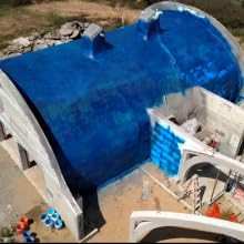 Blue Max Liquid Rubber applied to an earth shelter home as a waterproof coating and air barrier.