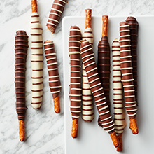 Caramel and Chocolate Dipped Pretzel Rods in dark, white, and milk chocolate, with chocolate stripes