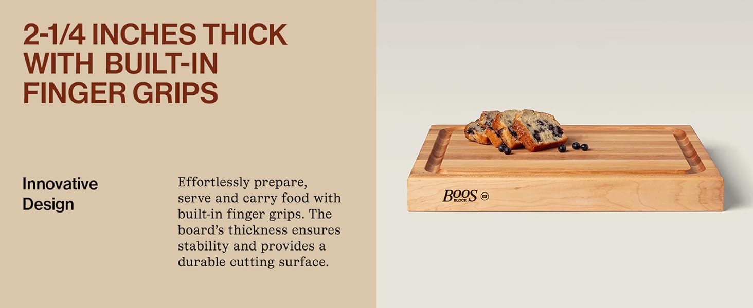 Maple cutting board with loaves on surface. Text Reads: 2-1/4" Thick with Built-In Finger Grips.