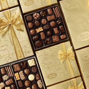 Gold boxes of chocolates in a row