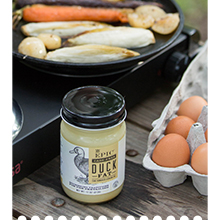 EPIC duck fat jar on outdoor table ready to be used for frying.