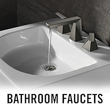 image of a bathroom faucet with water on