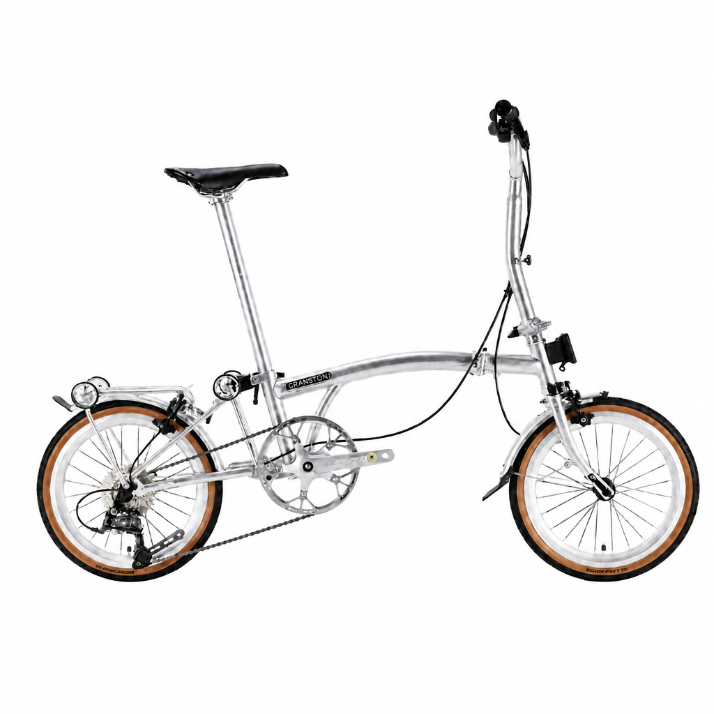 Classic Silver CRANSTON R9 tri-fold bike featuring a polished frame and city-ready tires.