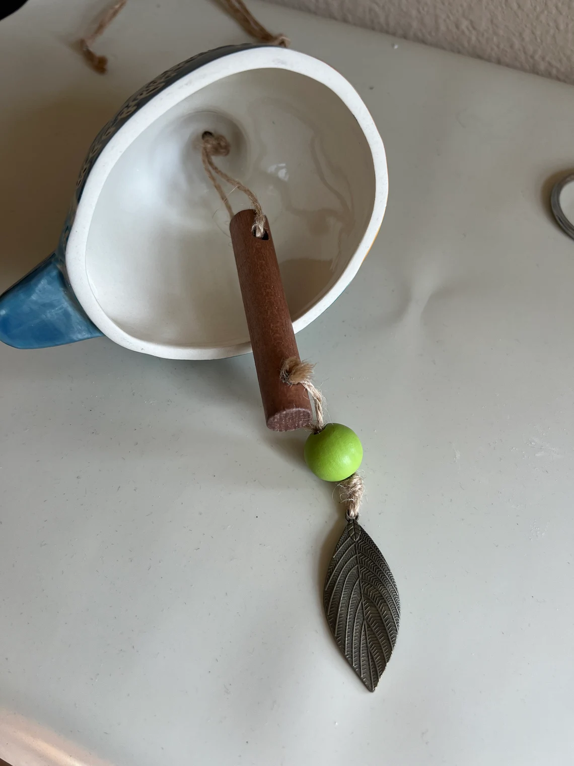 Ceramic Bird wind chimes 5" wide.