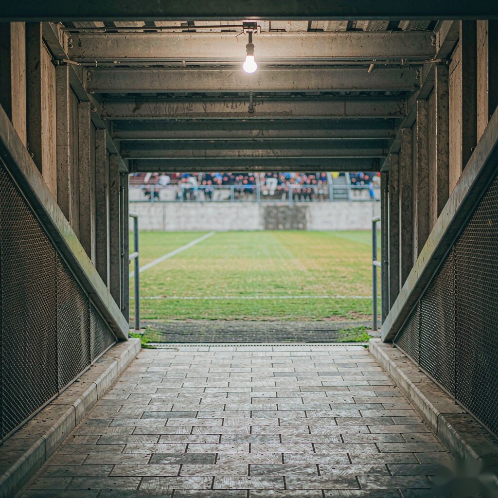 Stadium tunnel and end zone abstract view