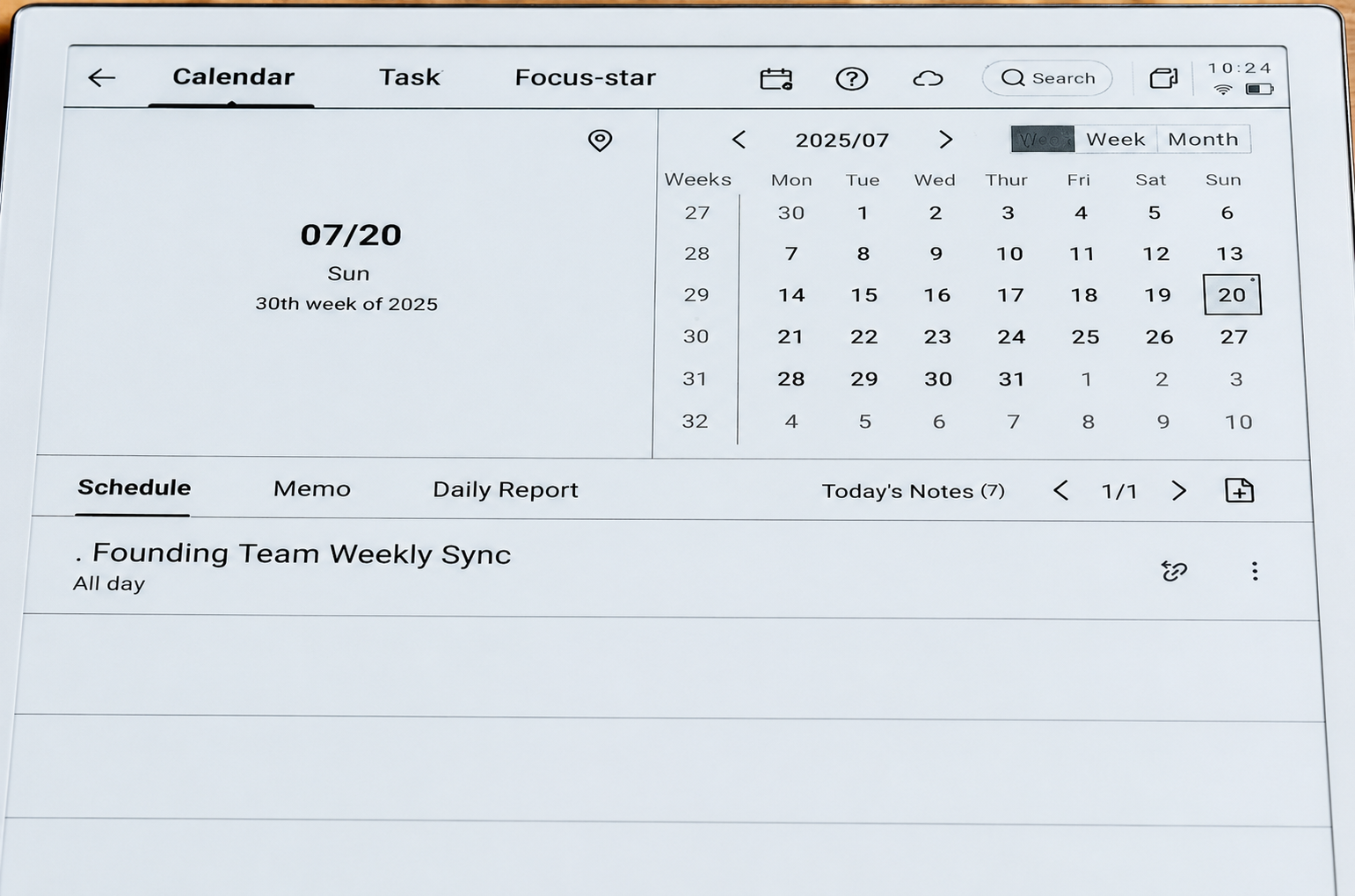 Digital calendar tablet displaying weekly schedule and meeting reminder